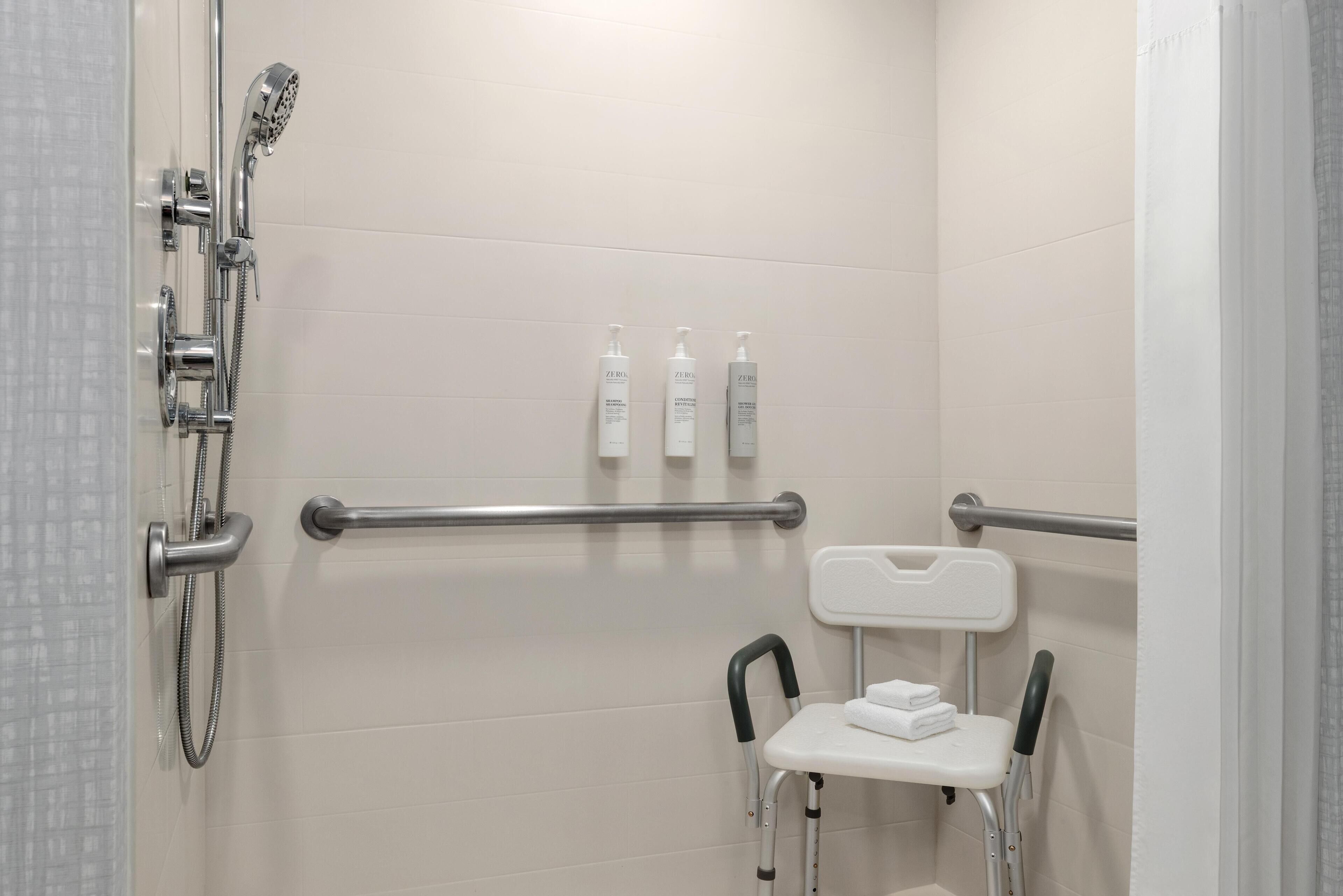Room, 1 King Bed, Accessible (Roll-In Shower) | Bathroom shower