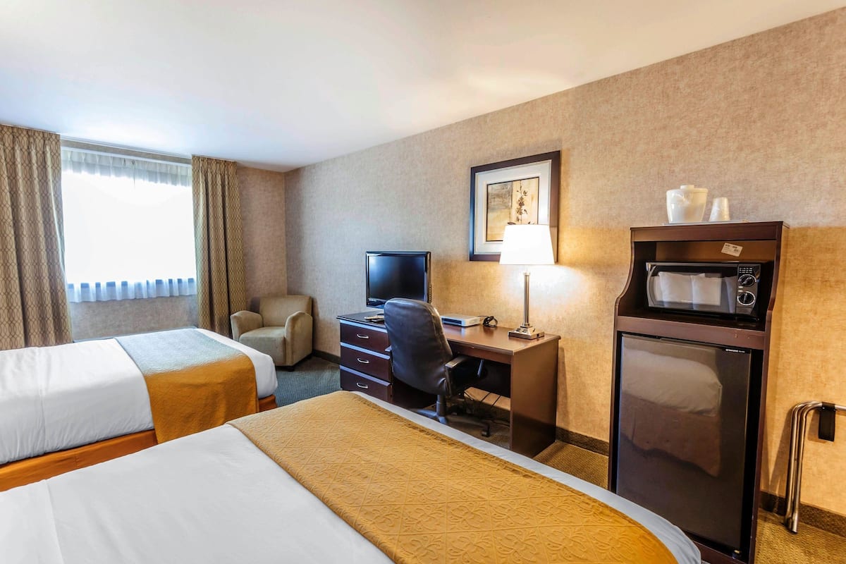 Standard Room, 2 Queen Beds, Non Smoking | In-room safe, individually decorated, individually furnished, desk