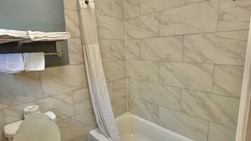 Separate tub and shower, hair dryer, towels