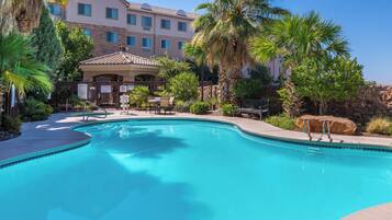 Outdoor pool, open 8:00 AM to 10:00 PM, pool umbrellas, sun loungers