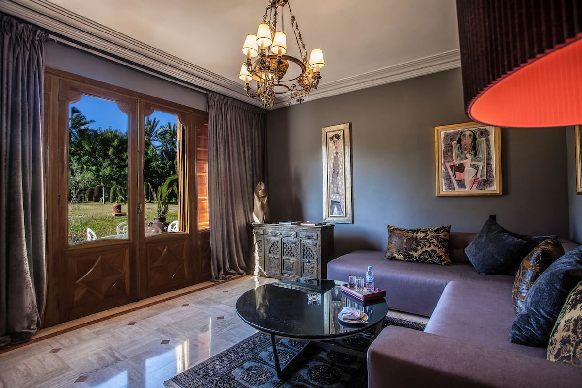 Executive Suite | 1 bedroom, minibar, in-room safe, individually decorated