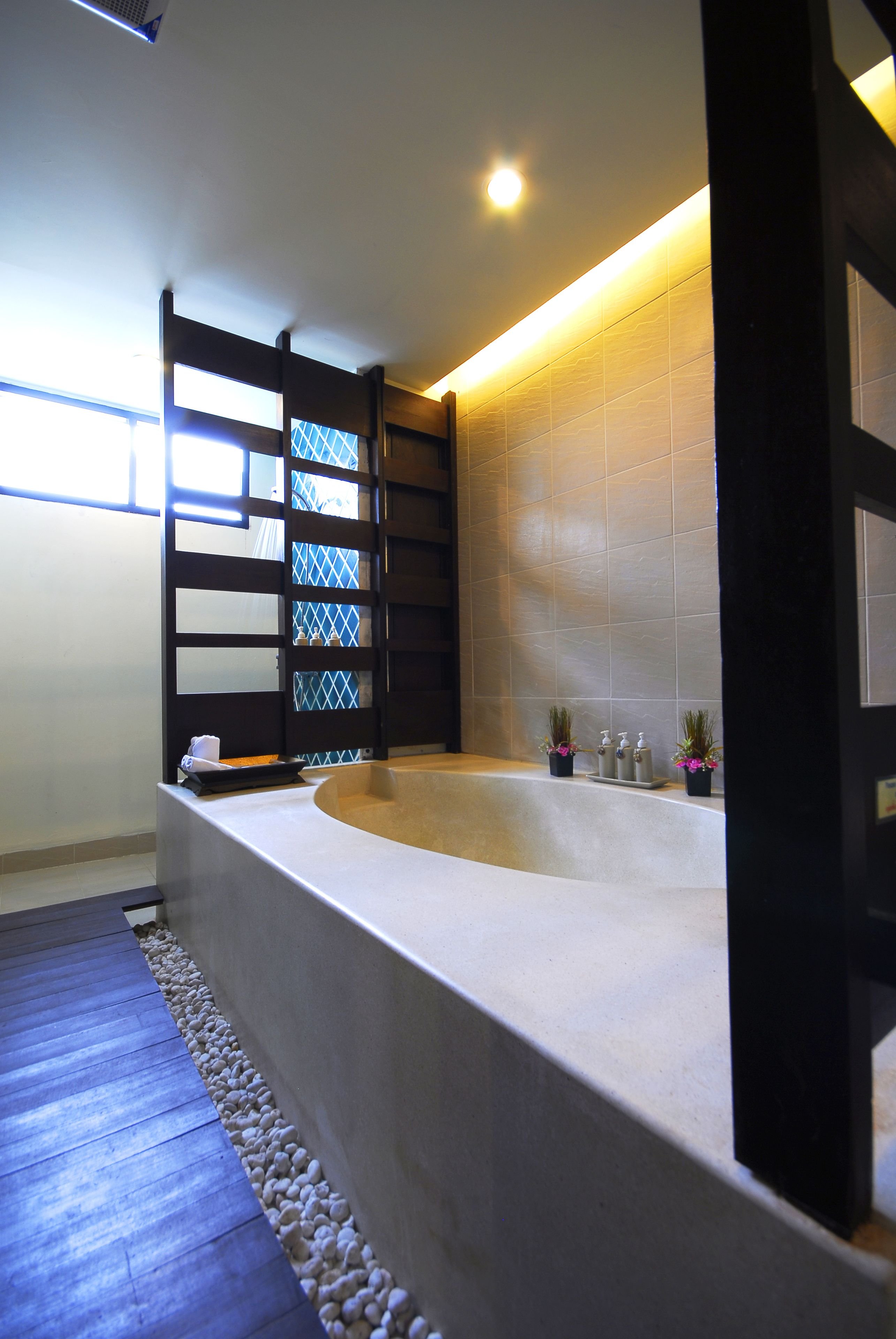 orchid family suite (2 bedrooms) | bathroom | separate bathtub and shower, free toiletries, hair dryer, bathrobes