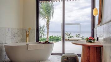 The Level Grand 3 Bedroom Ocean Villa | Bathroom | Free toiletries, hair dryer, bathrobes, slippers