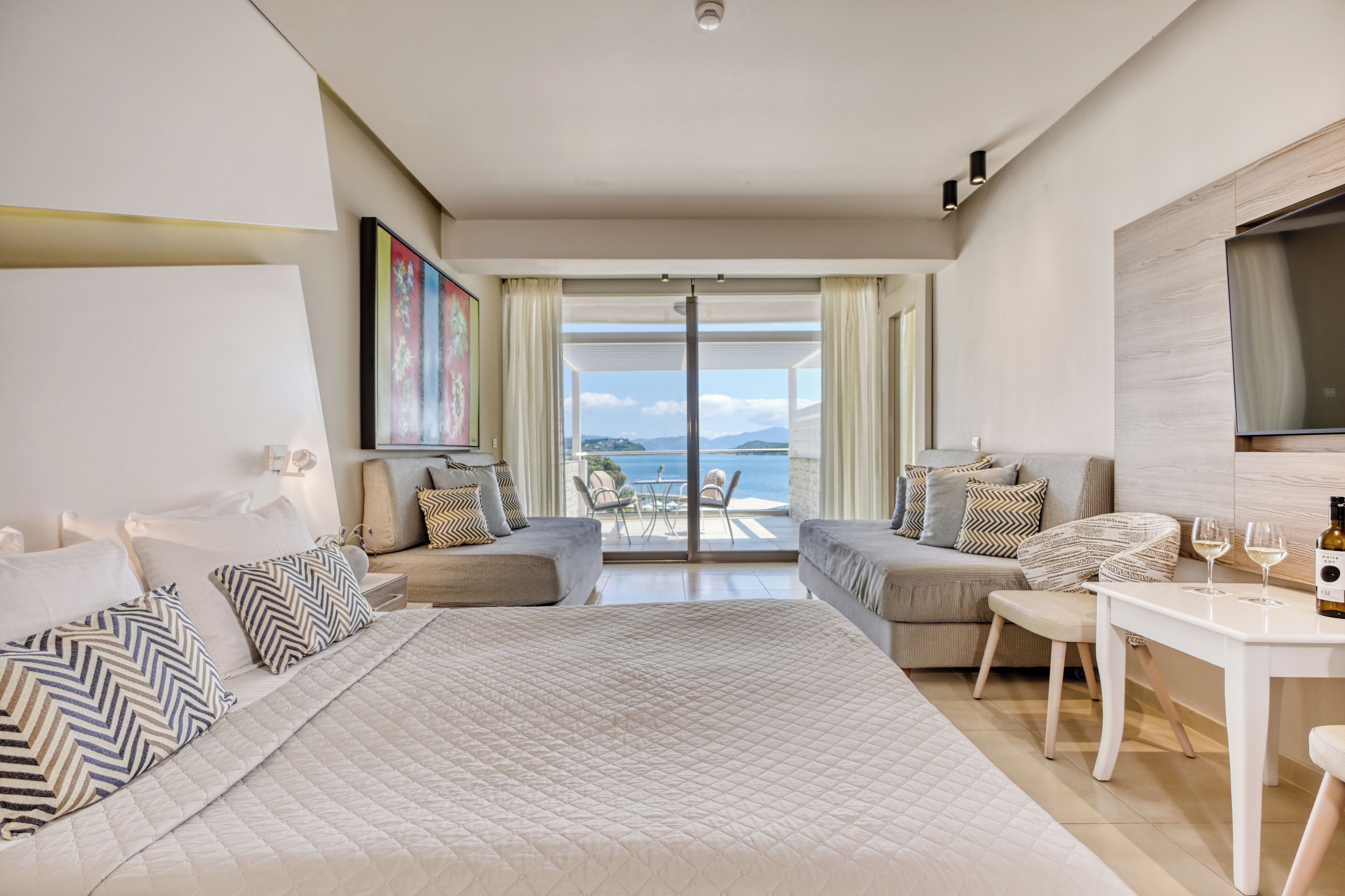 Family Room, Sea View | In-room safe, blackout drapes, soundproofing, bed sheets