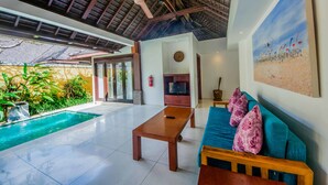 One Bedroom Pool Villa | Living area | LCD TV