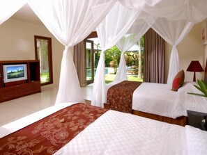 Pillow-top beds, in-room safe, individually furnished, laptop workspace - Grand Avenue Bali (Kerobokan)