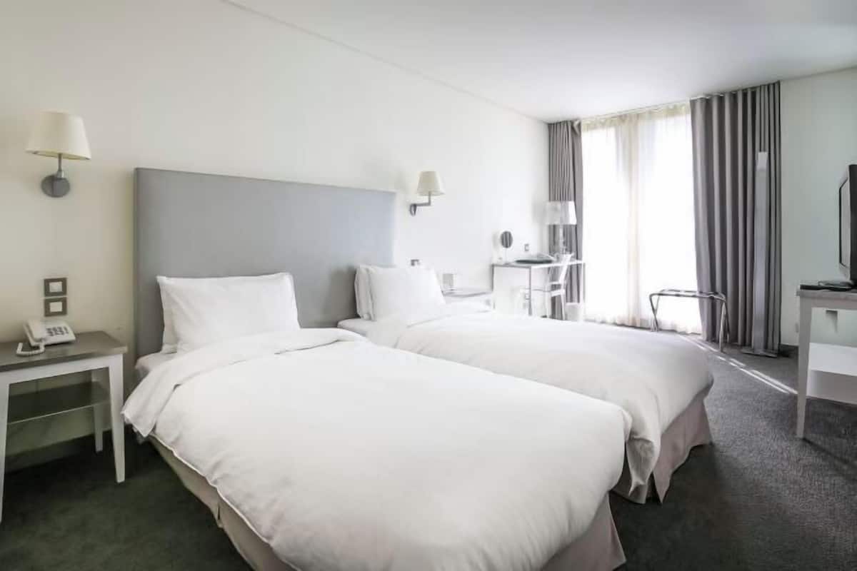 Luxe beddengoed, donzen dekbedden, een gratis minibar