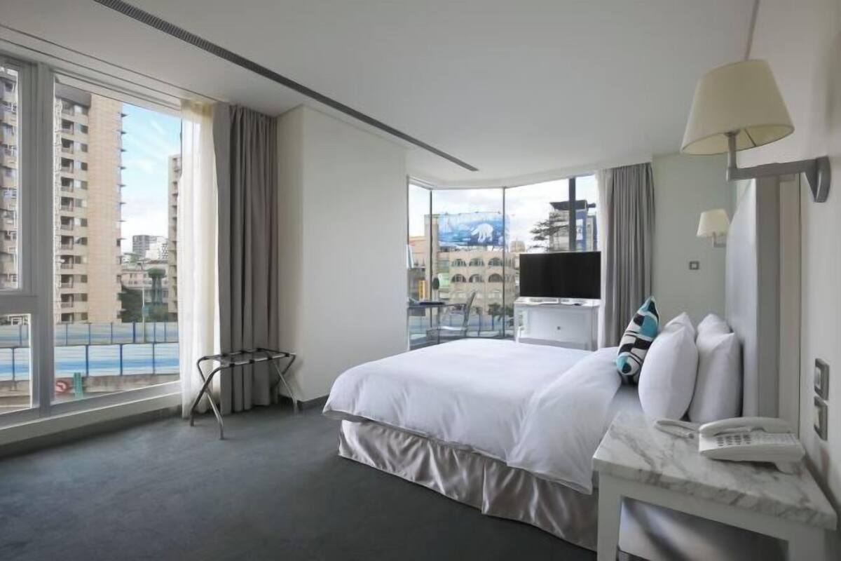 Luxe beddengoed, donzen dekbedden, een gratis minibar
