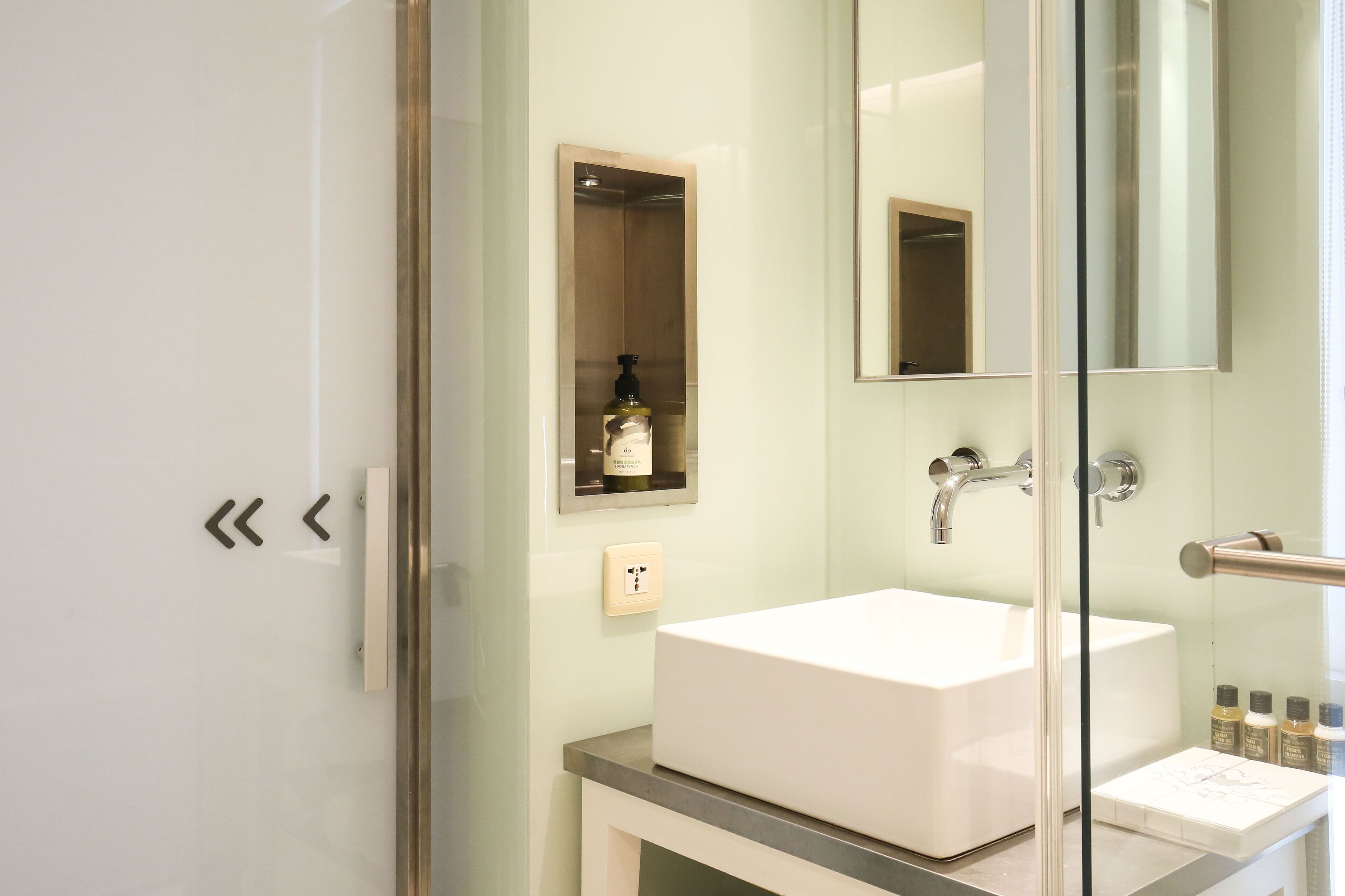 hair dryer, slippers, towels, shampoo