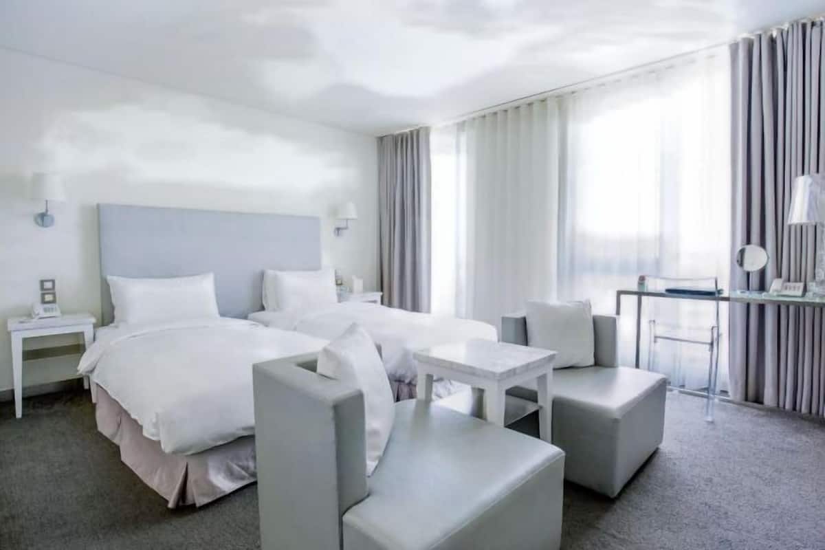 Luxe beddengoed, donzen dekbedden, een gratis minibar