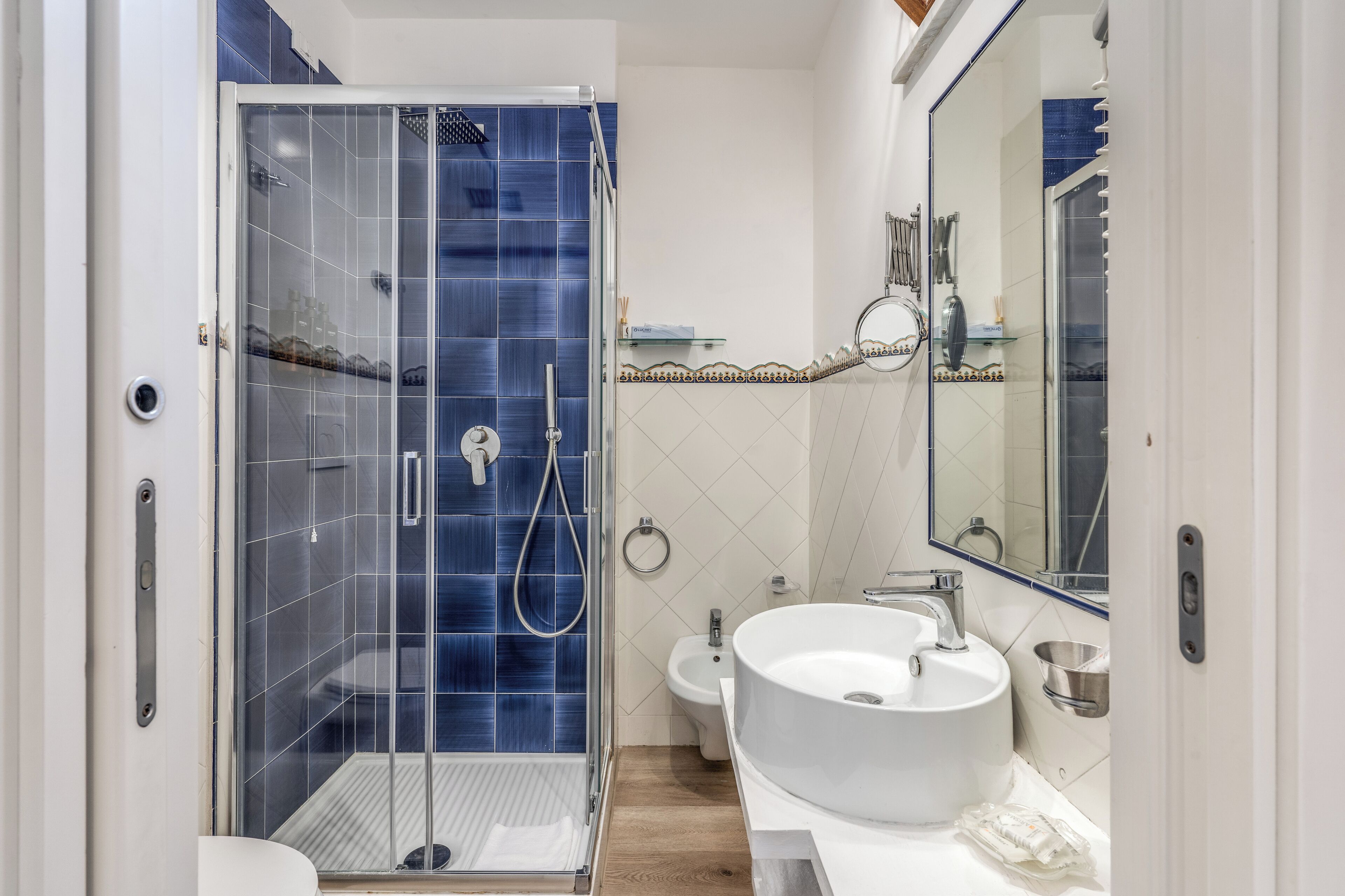 standard triple room | bathroom | shower, rainfall showerhead, hair dryer, soap