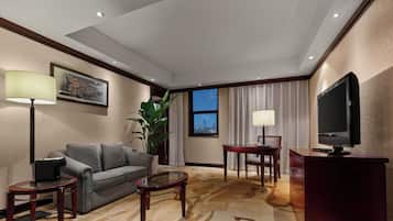 Suite Deluxe, 1 cama King size | 1 habitación, caja de seguridad en la habitación y escritorio