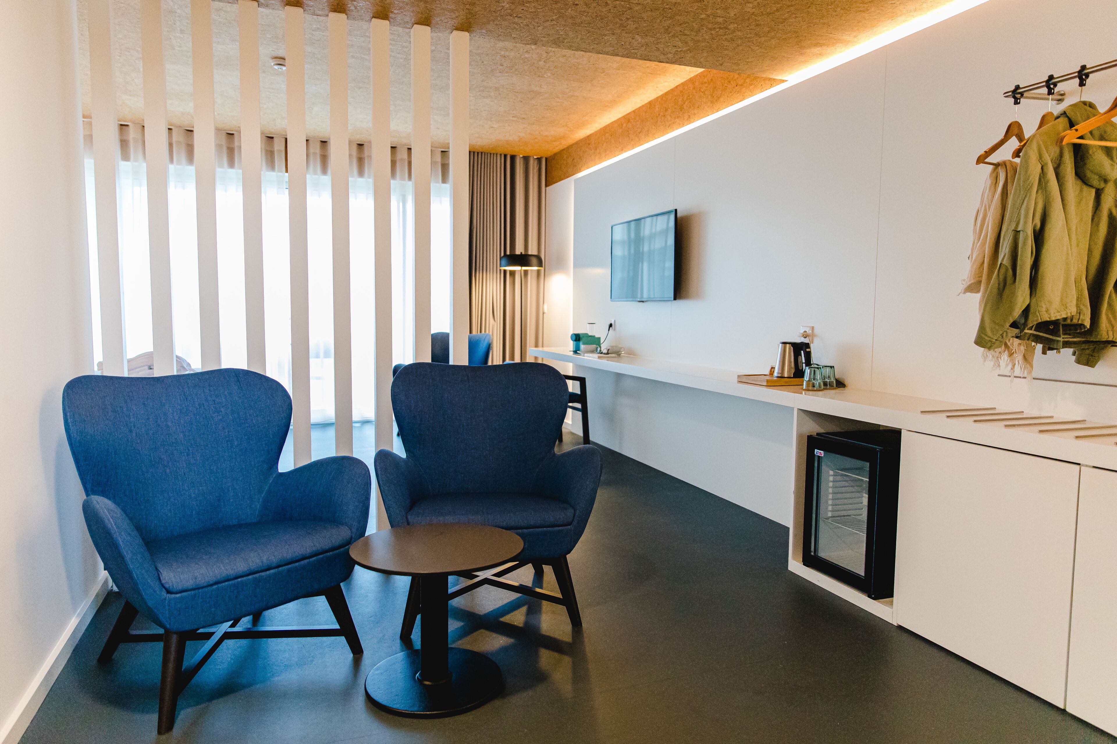 Suíte júnior | Frigobar, cofres nos quartos, escrivaninha