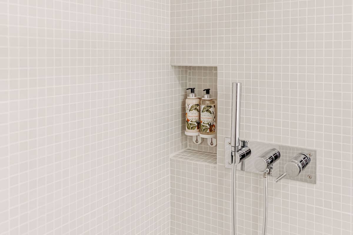 double room | bathroom | shower, rainfall showerhead, eco-friendly toiletries, hair dryer