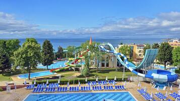 Enjoy scenic views of the water from your balcony overlooking the resort's pools and water park.