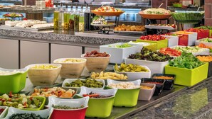 A buffet with various food items and containers. - Sol Nessebar Palace - All Inclusive (Nessebar)