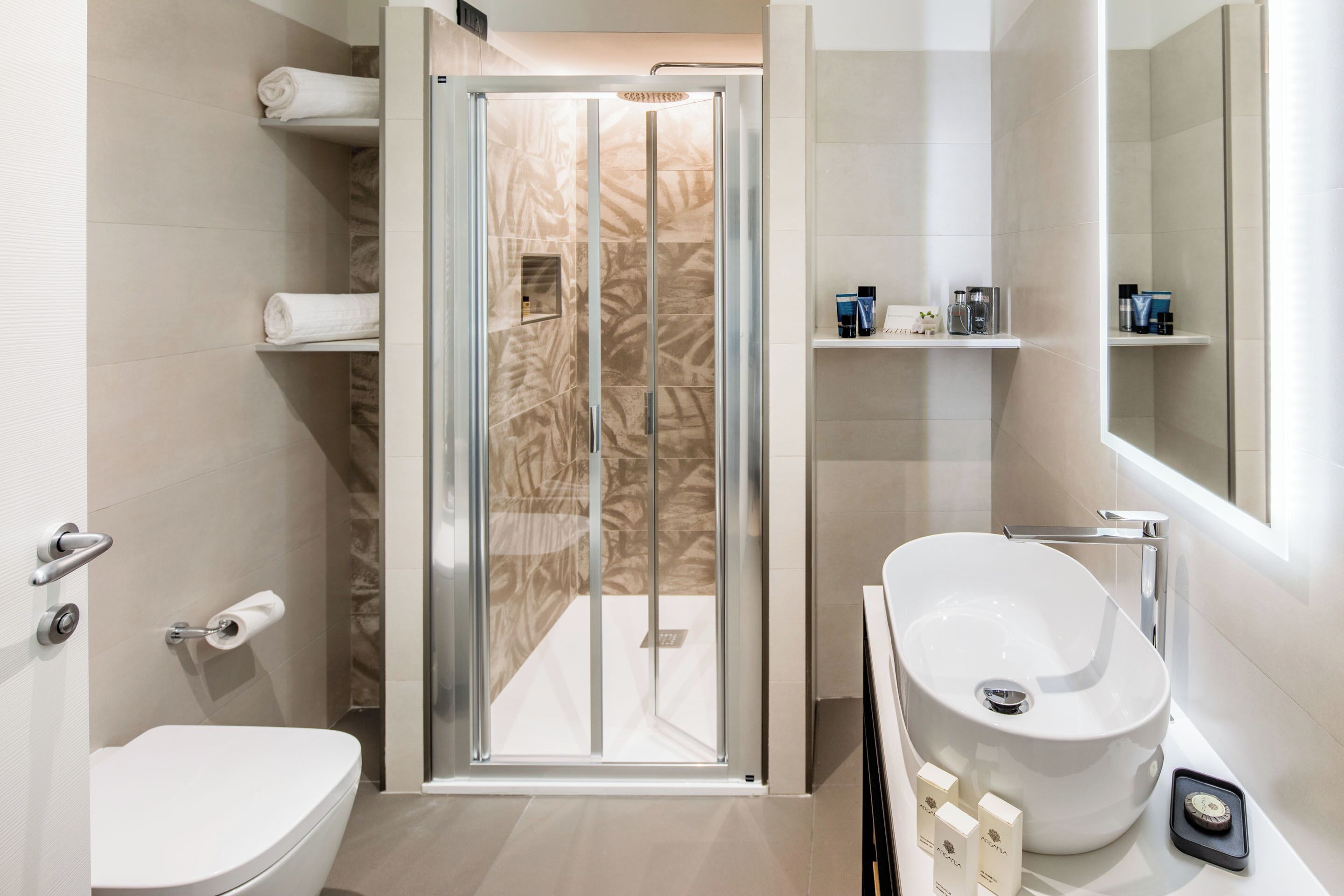 free toiletries, hair dryer, bidet, towels