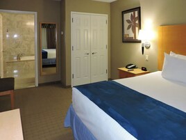 Executive Suite, 1 Bedroom | Premium bedding, down comforters, pillowtop beds, in-room safe
