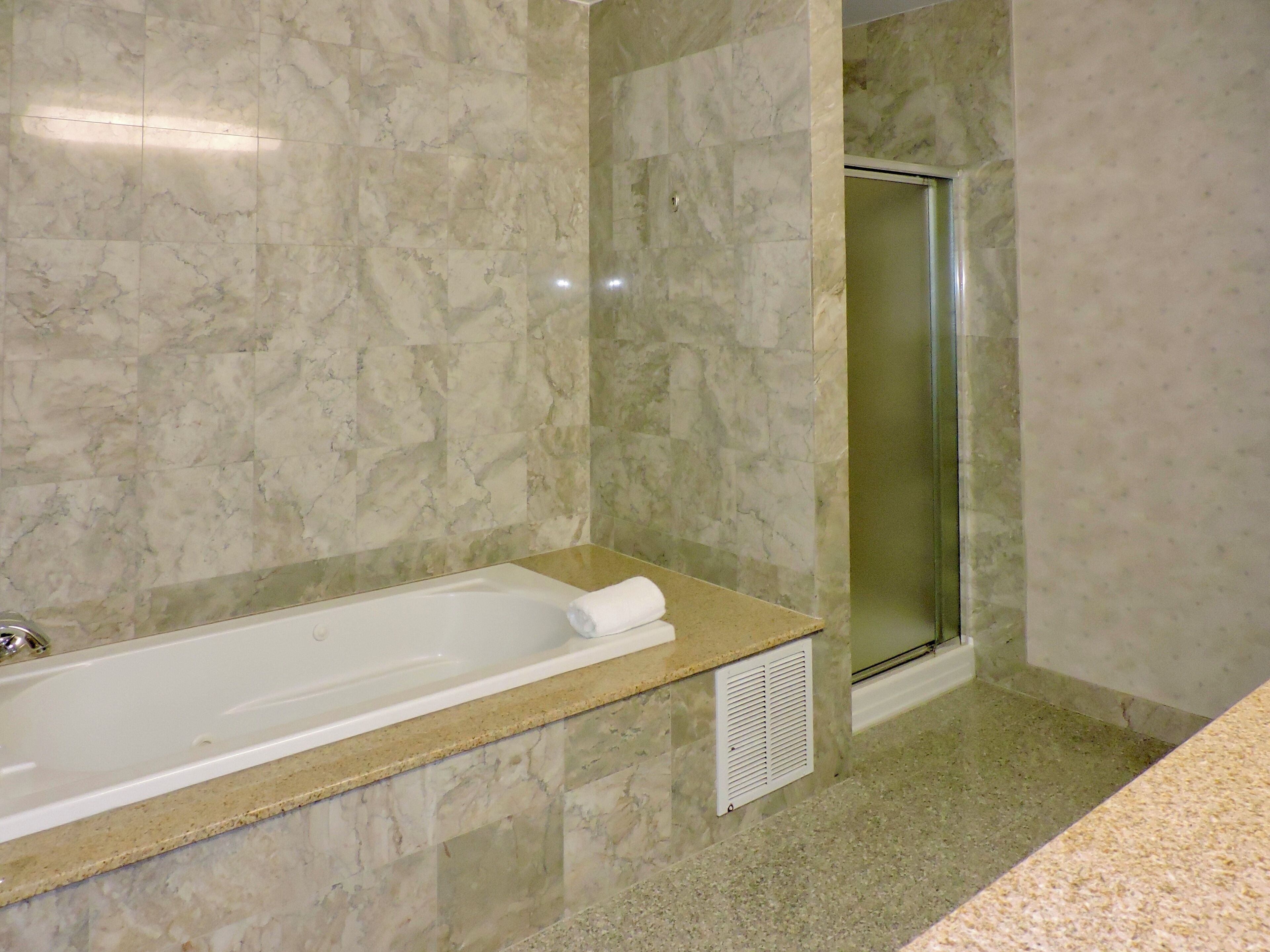 family suite, 2 bedrooms | bathroom | combined shower/bathtub, free toiletries, hair dryer, towels