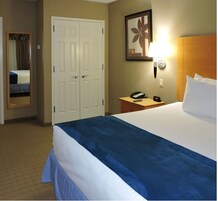 行政套房, 1 间卧室 | 高档床上用品、羽绒被、加厚床垫、客房内保险箱