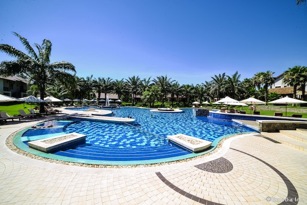 Outdoor pool, pool umbrellas, pool loungers
