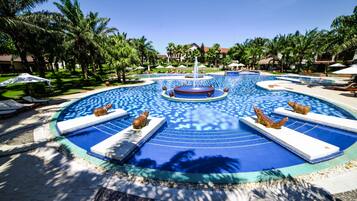 Outdoor pool, pool umbrellas, sun loungers
