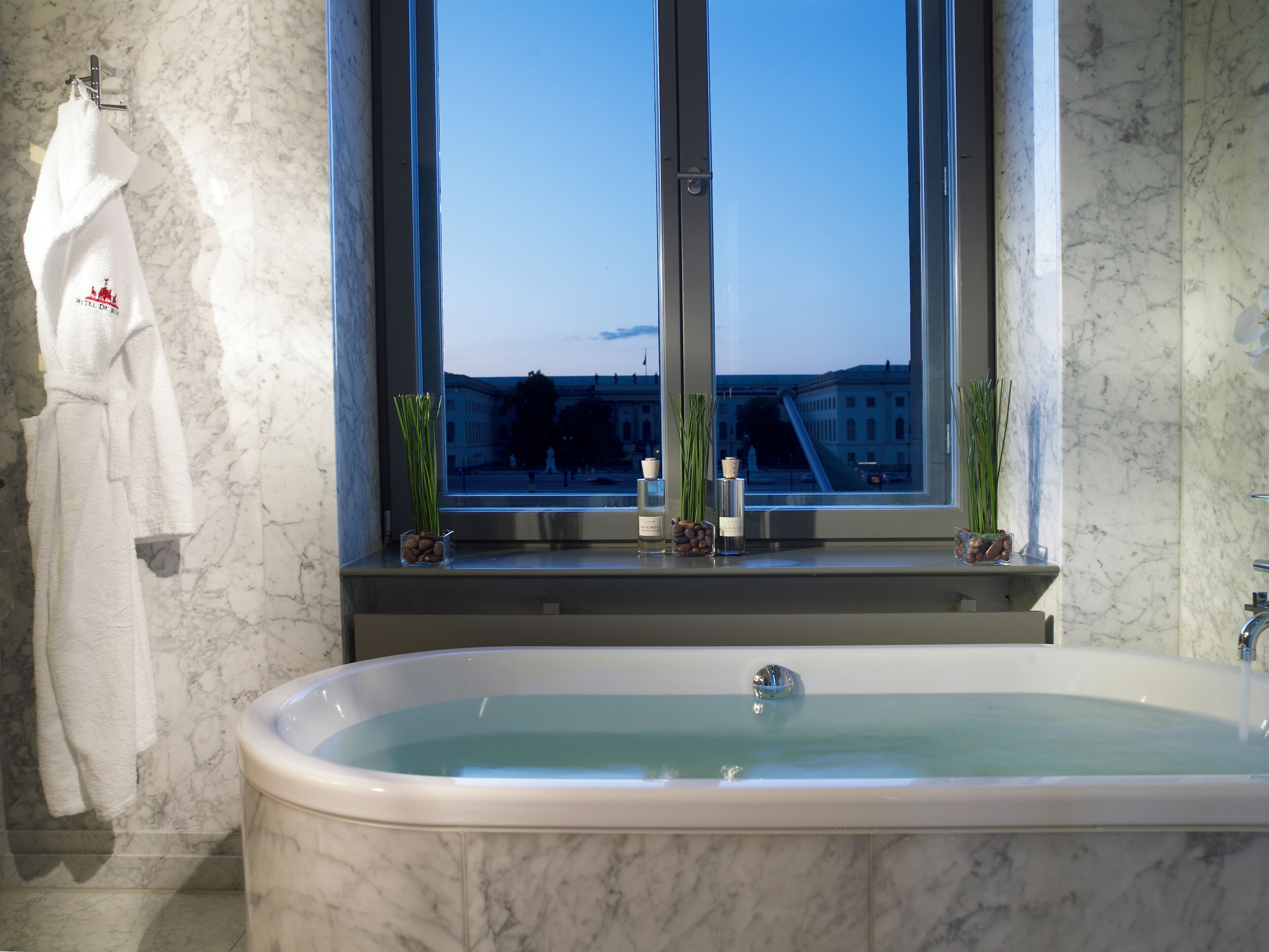 suite (humboldt) | bathroom | separate bathtub and shower, rainfall showerhead, designer toiletries