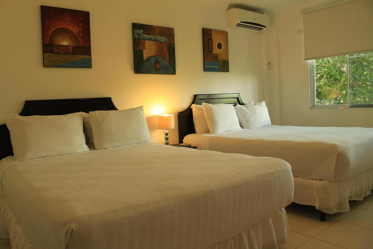 Premium bedding, in-room safe, individually decorated