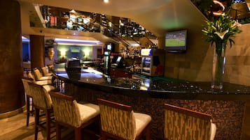 3 bars/lounges, poolside bar