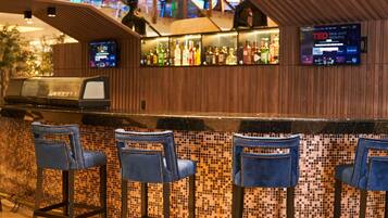 3 bars/lounges, poolside bar