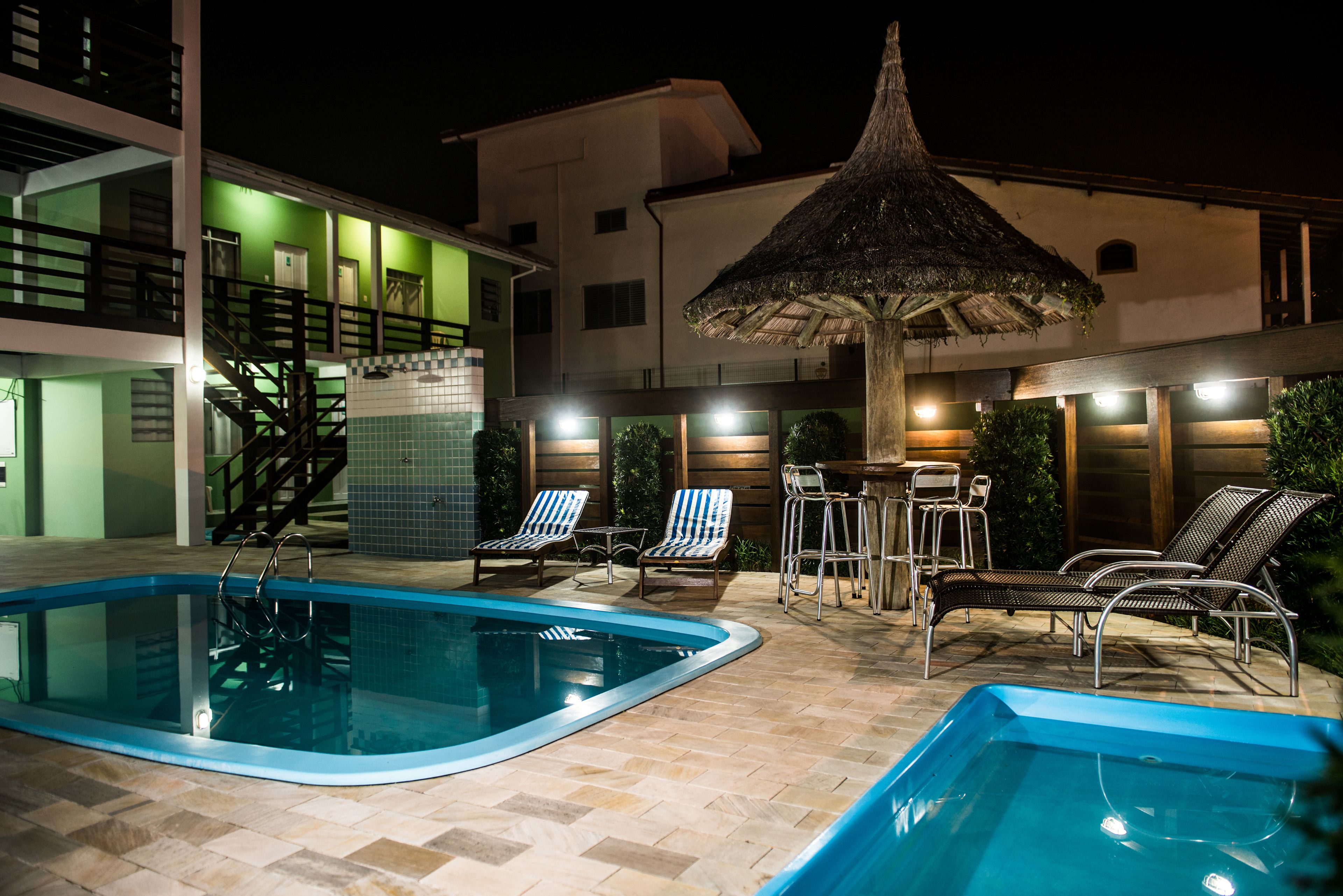 Outdoor pool, open 9 AM to 8 PM, pool loungers