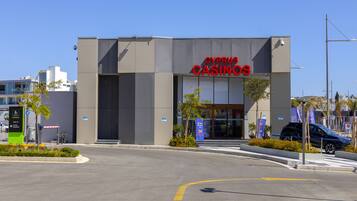 A modern building with a sign reading "CYPRUS CASINOS".
