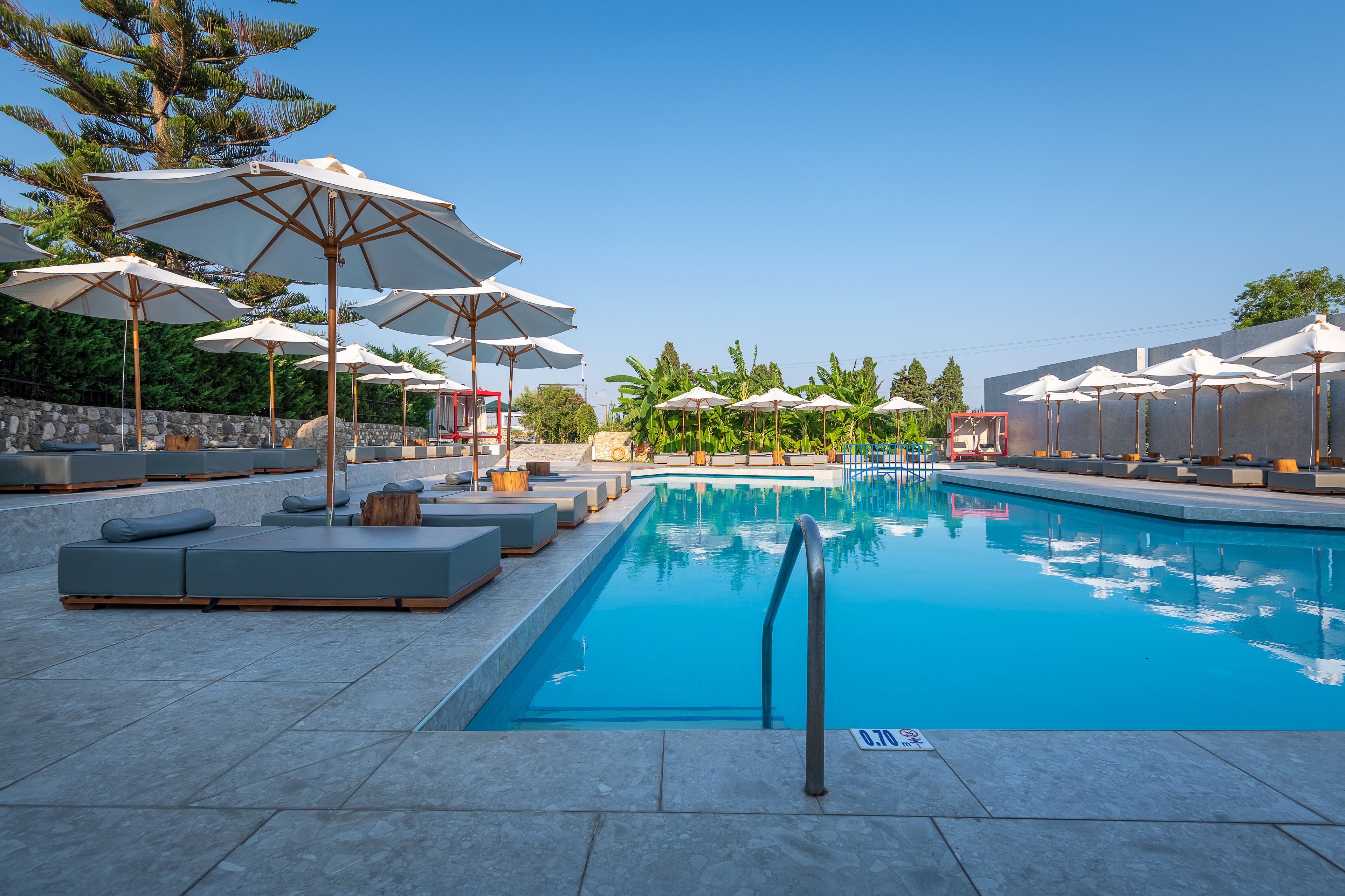 outdoor pool, pool umbrellas, pool loungers