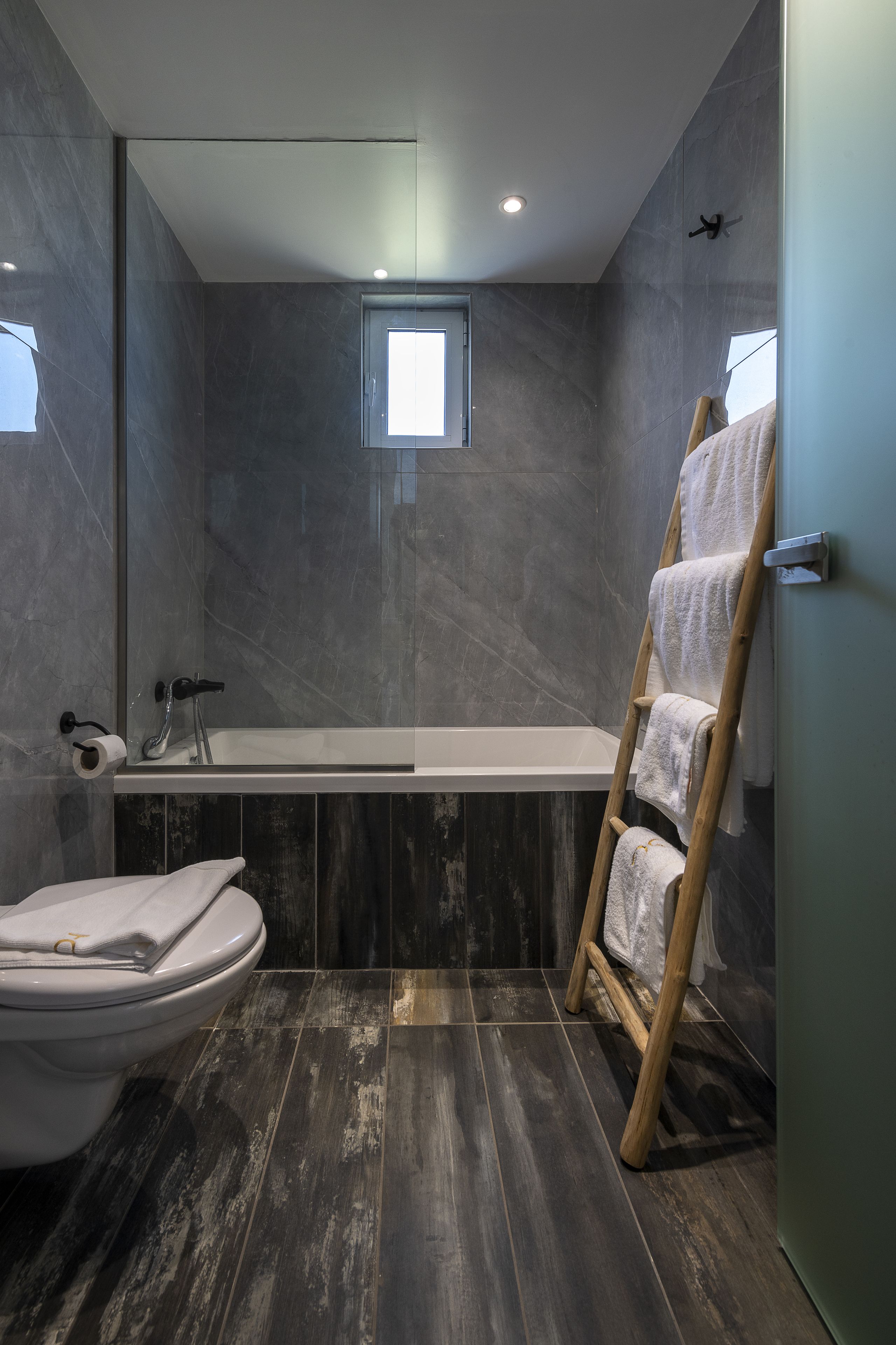 family room | bathroom | hair dryer, bathrobes, slippers, towels