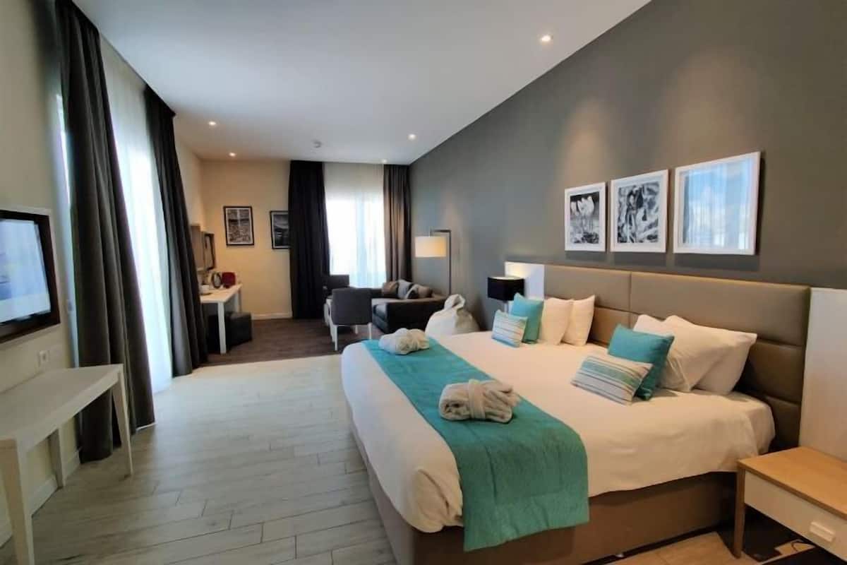 In-room safe, desk, blackout curtains, soundproofing