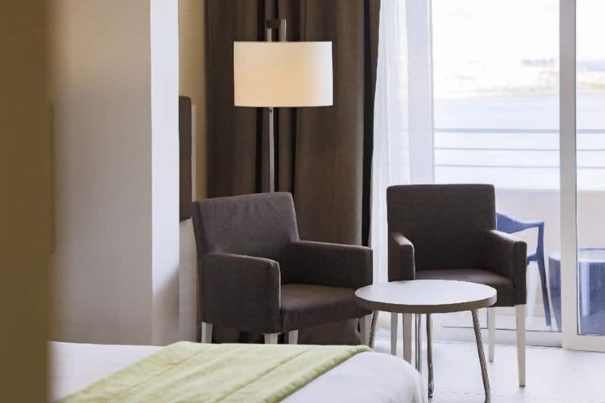 In-room safe, desk, blackout curtains, soundproofing