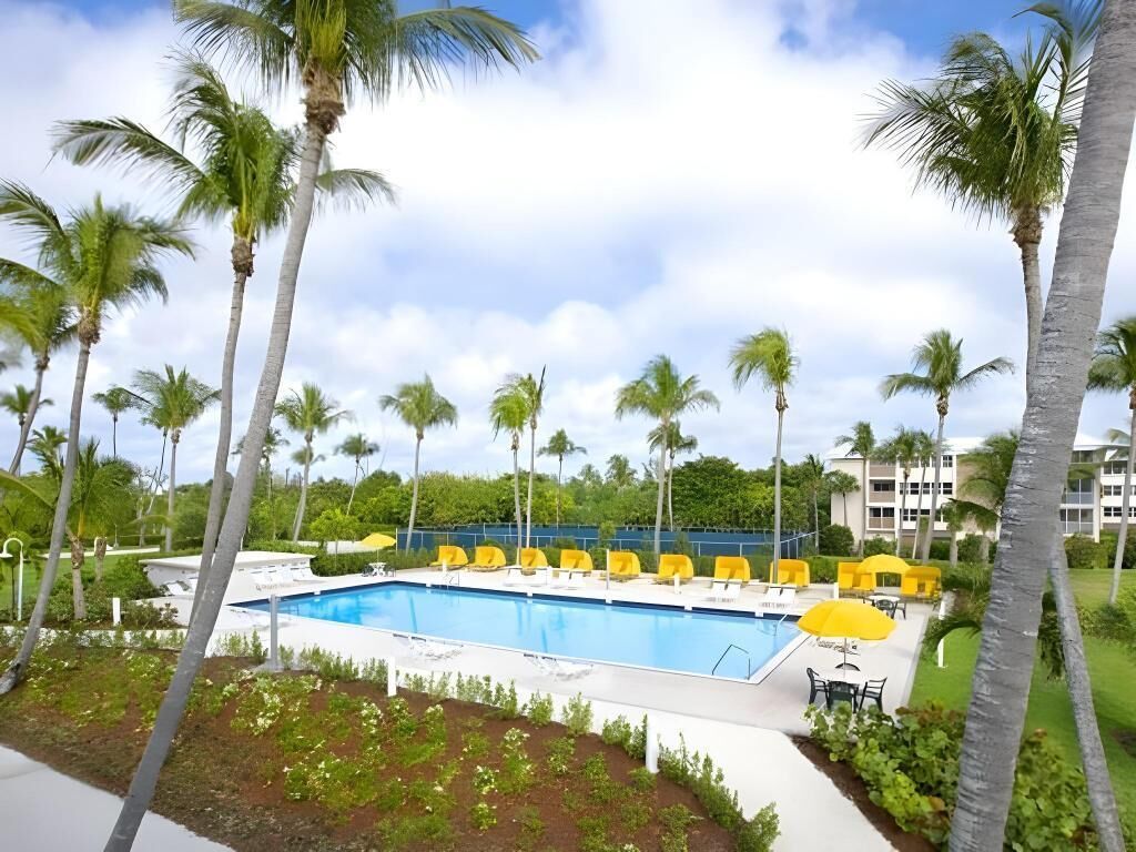 Outdoor pool, open 7:00 AM to 8:00 PM, pool umbrellas, pool loungers