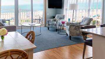 Two Bedroom / 2 Bath Premier Ocean Front Suite | Living area | Flat-screen TV