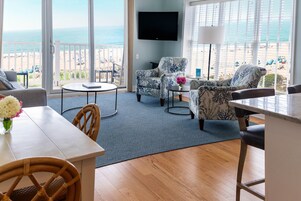 Two Bedroom / 2 Bath Premier Ocean Front Suite | Living area | Flat-screen TV