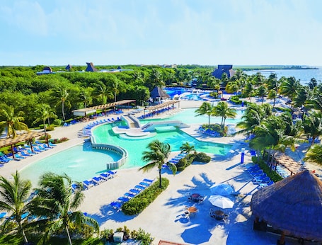 3 outdoor pools, pool umbrellas, sun loungers. BlueBay Grand Esmeralda All Inclusive