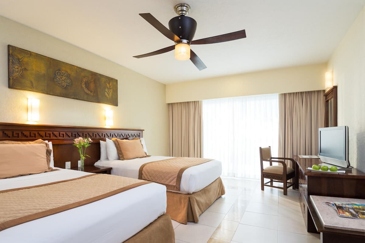 Free minibar, in-room safe, blackout curtains, iron/ironing board