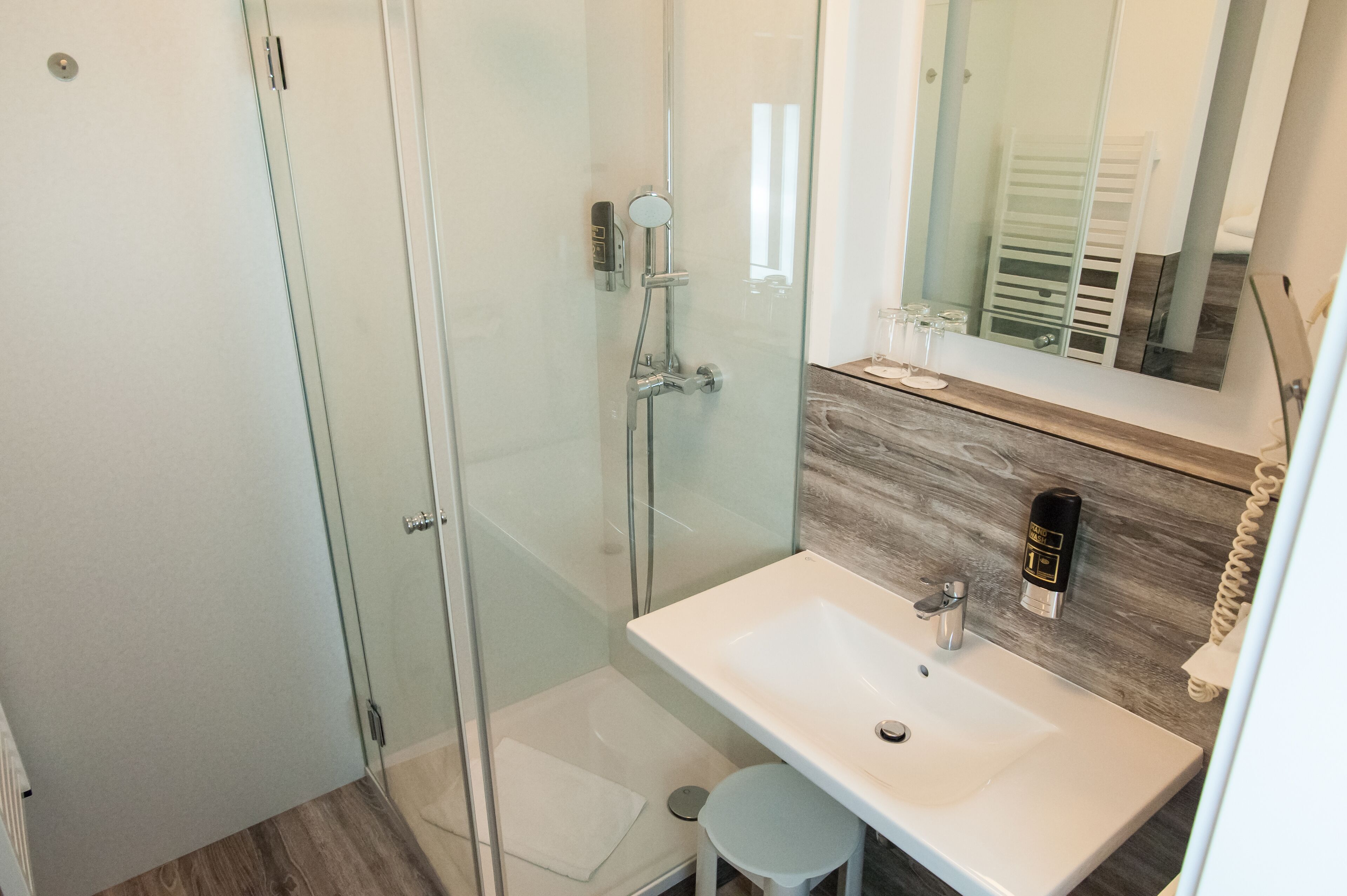 hair dryer, towels, soap, shampoo