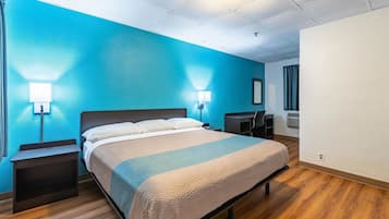 Desk, laptop workspace, blackout curtains, iron/ironing board