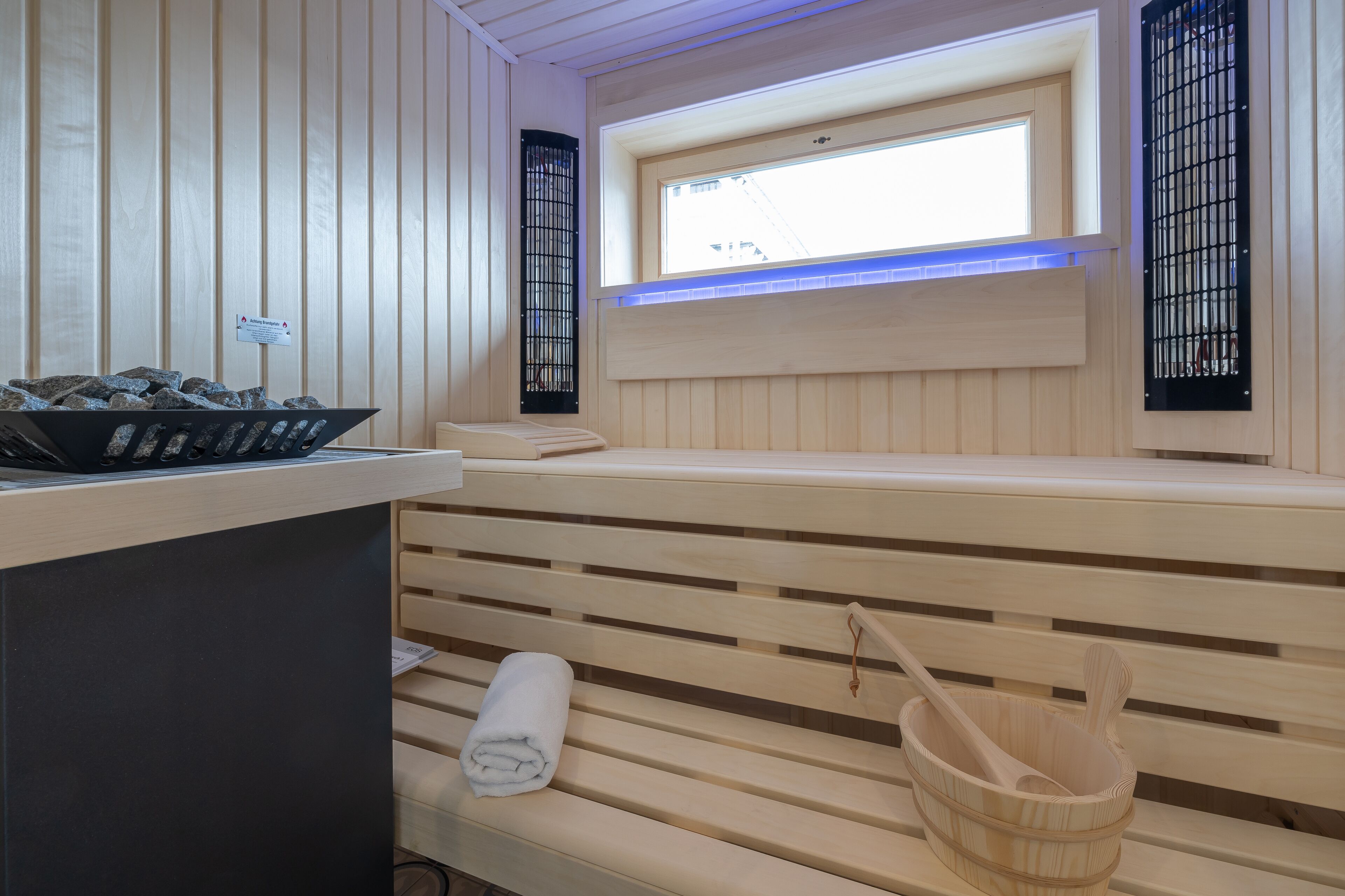 junior wellness suite with private sauna | bathroom | free toiletries, hair dryer, bathrobes, slippers