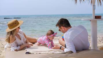Relax on the beach with a serene ocean view.