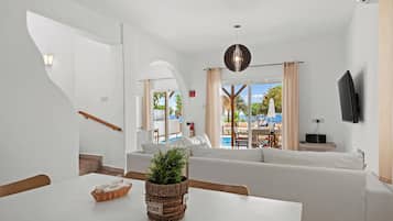 Panoramic Villa | Living area | Flat-screen TV, DVD player