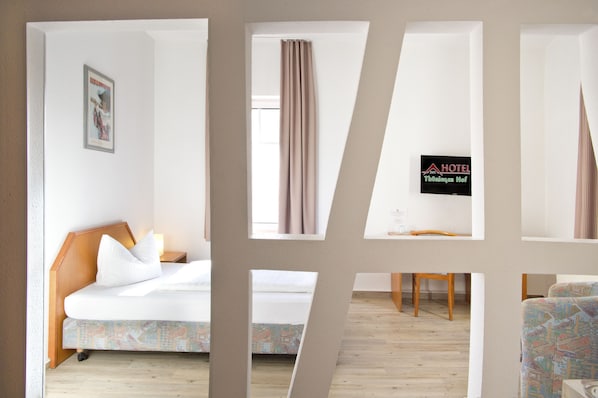 Habitación individual Confort | Sistema de insonorización, wifi gratis, ropa de cama