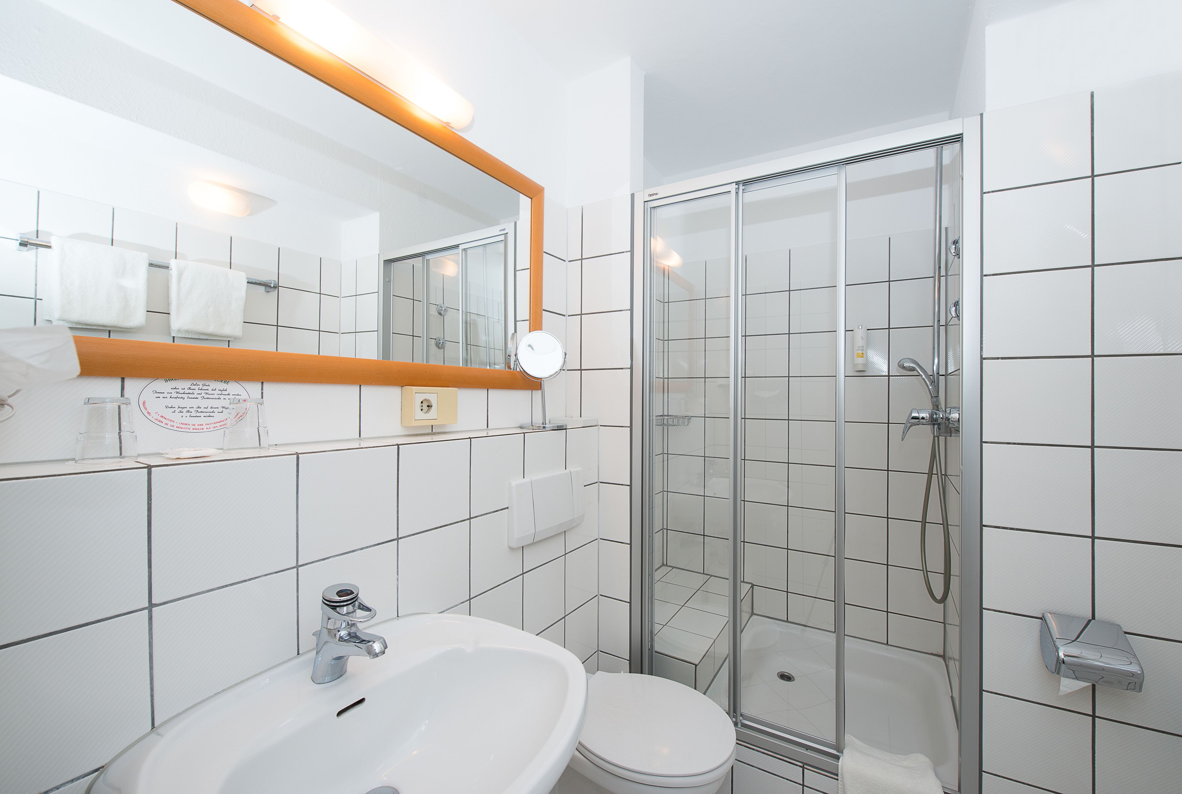 shower, eco-friendly toiletries, hair dryer, slippers