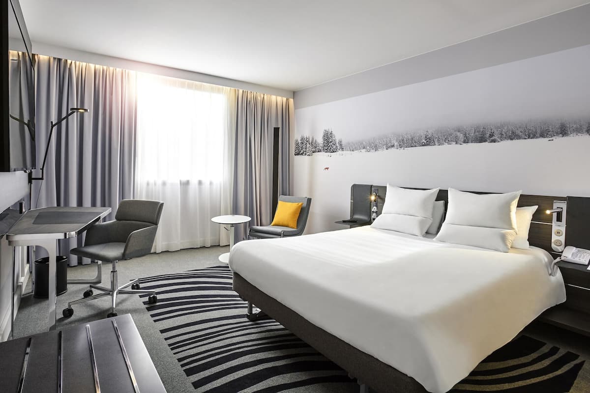 Habitación ejecutiva, 1 cama matrimonial | Ropa de cama de alta calidad y artículos del minibar gratis