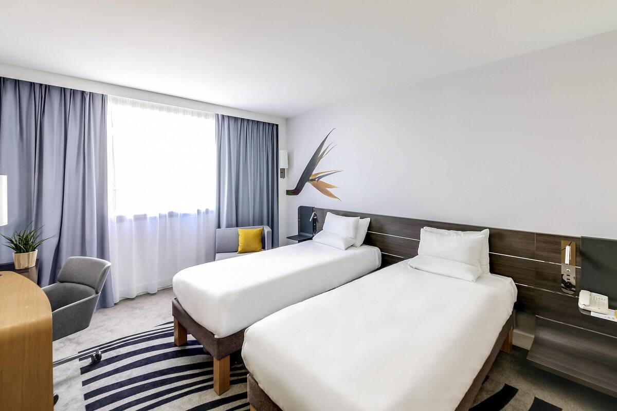 Premium bedding, free minibar items, in-room safe, desk